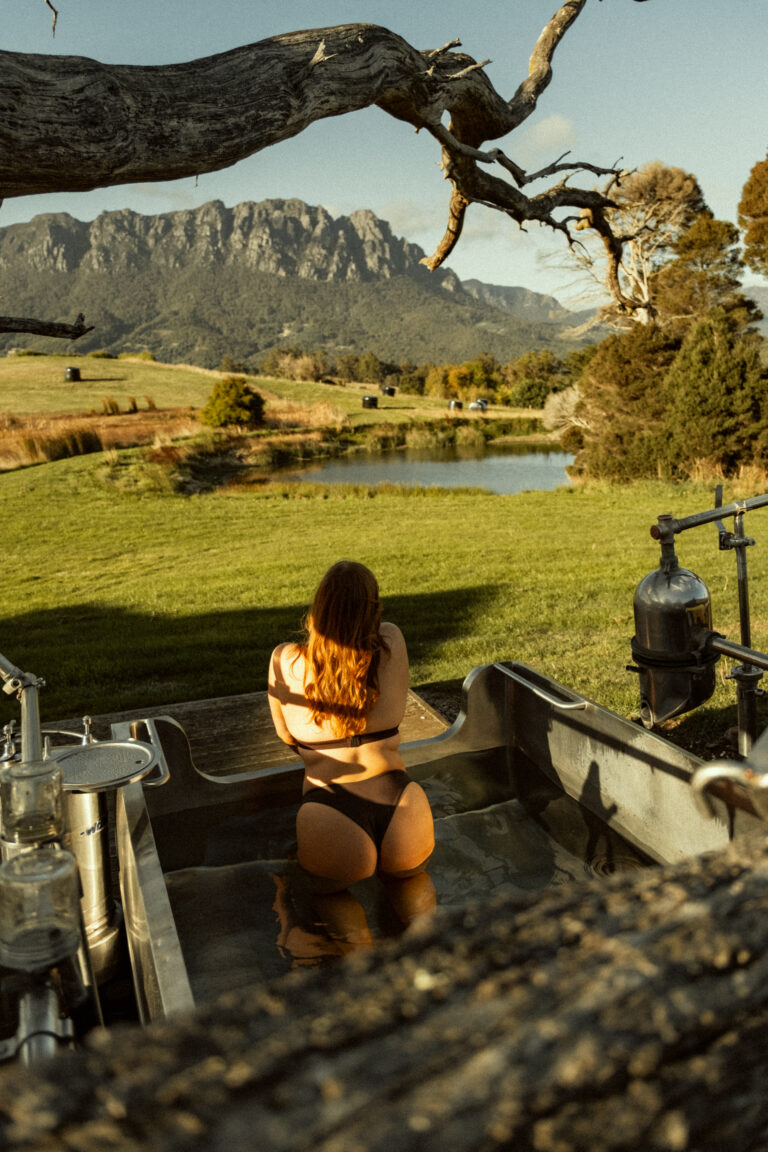 Outdoor bathing beneath Mount Roland is one of the signature wellness experiences at Eagles Nest Retreat.